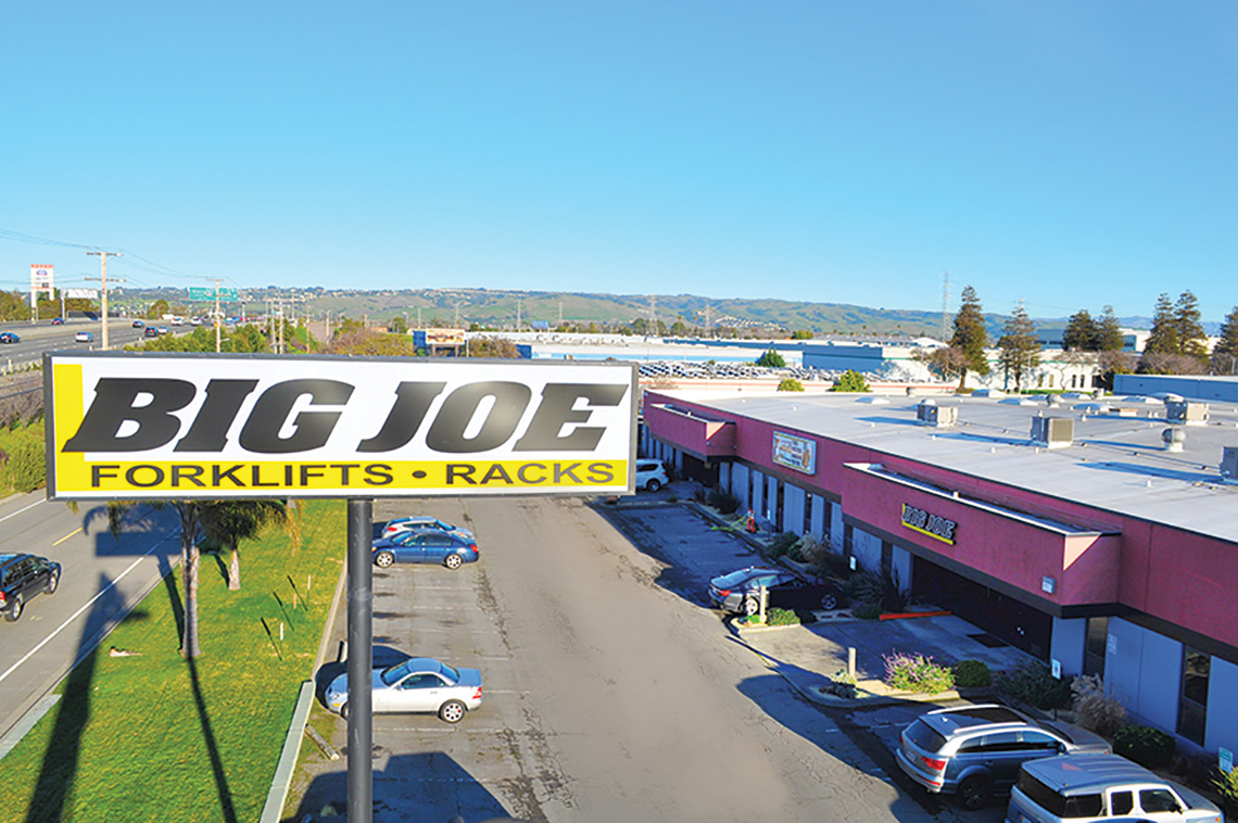 Aerial Shot of the Big Joe Sign In the Parking Lot Outside of the Big Joe Facility in Hayward California 